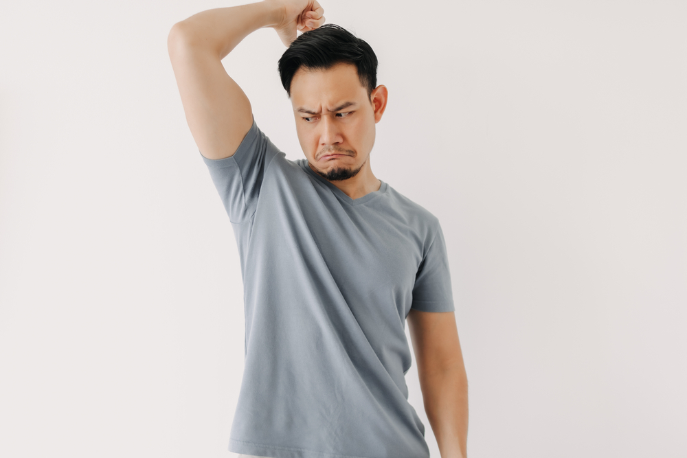 Asian,Man,Smells,His,Bad,Odor,Armpit,Isolated,On,White